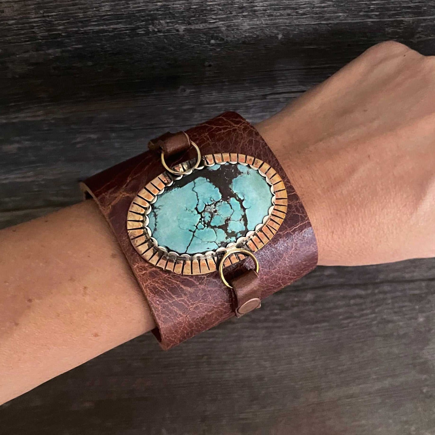 One of a kind genuine brown leather and oval-shaped Tibetan turquoise statement bracelet