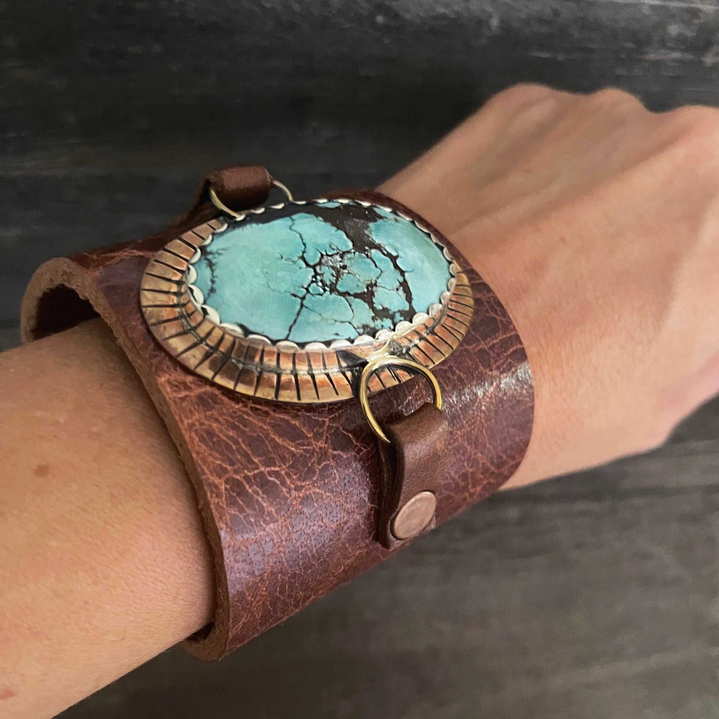 One of a kind genuine brown leather and oval-shaped Tibetan turquoise statement bracelet