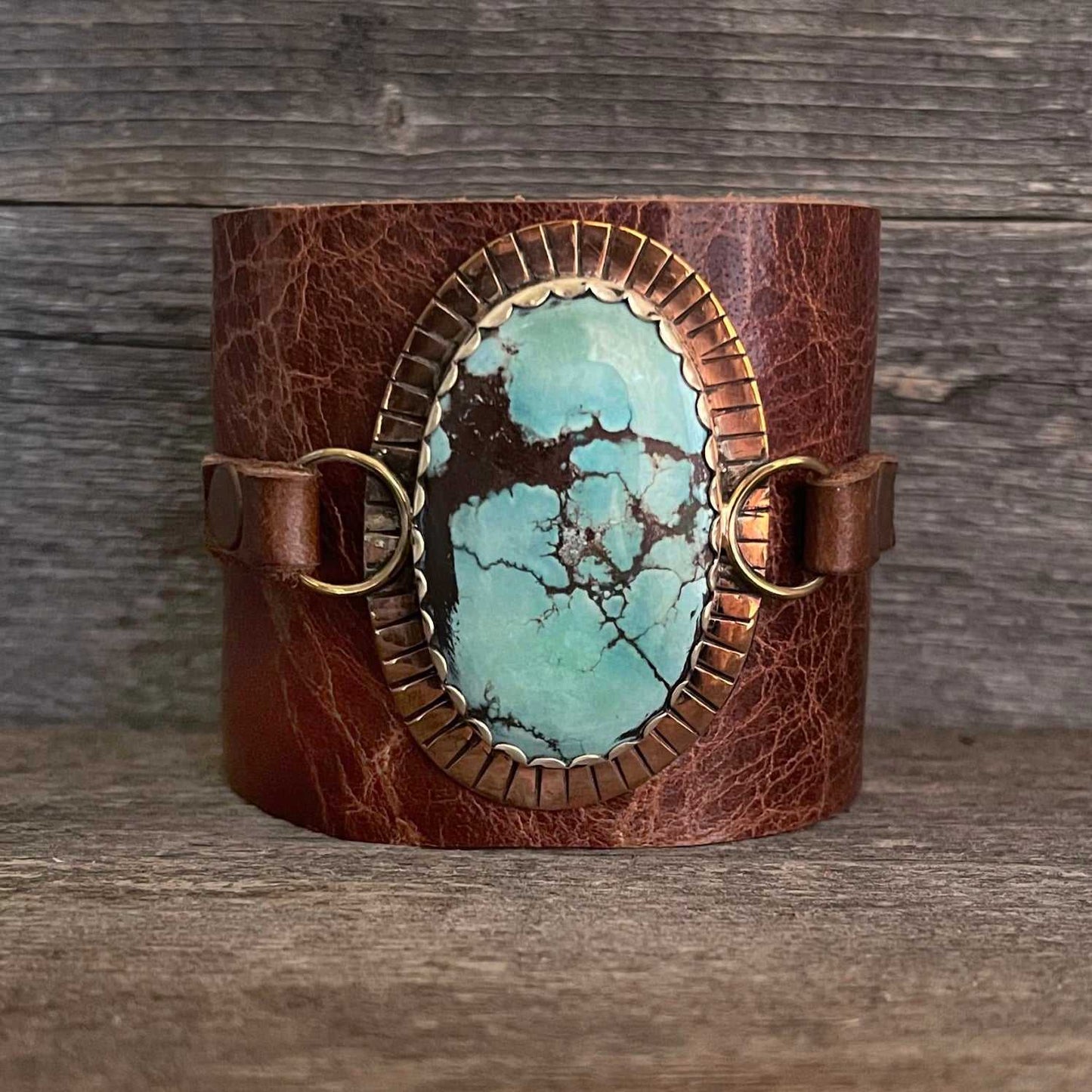 One of a kind genuine brown leather and oval-shaped Tibetan turquoise statement bracelet
