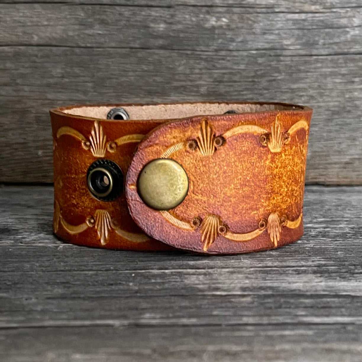 Genuine leather, hand-tooled, layered bracelet with small “Faith” word