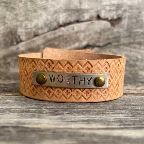 Genuine leather, hand-tooled bracelet with motivational word