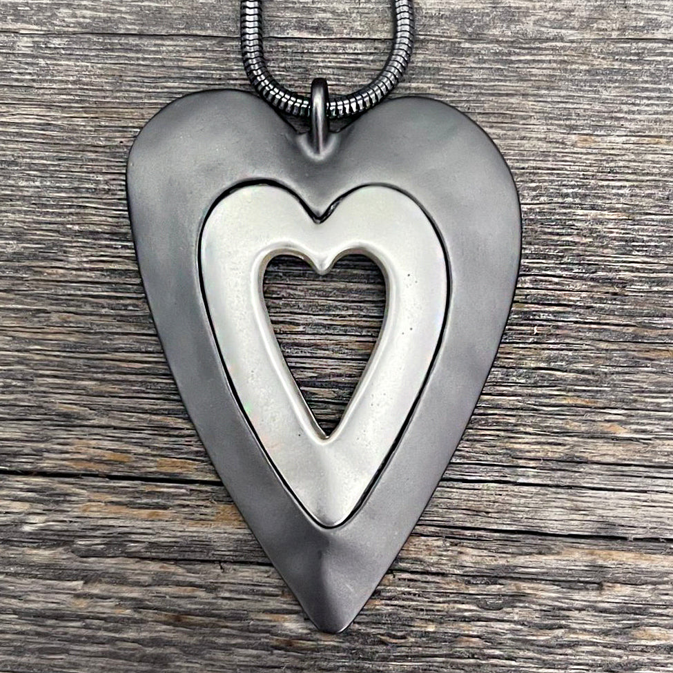 Two-tone, metal heart pendant necklace