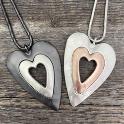 Two-tone, metal heart pendant necklace