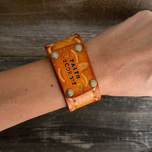 Genuine leather, hand-tooled, layered bracelet with small “Faith” word