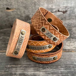 Genuine leather, hand-tooled bracelet with motivational word