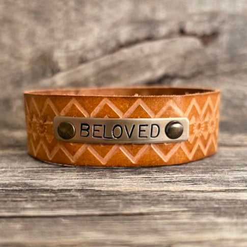 Genuine leather, hand-tooled bracelet with motivational word
