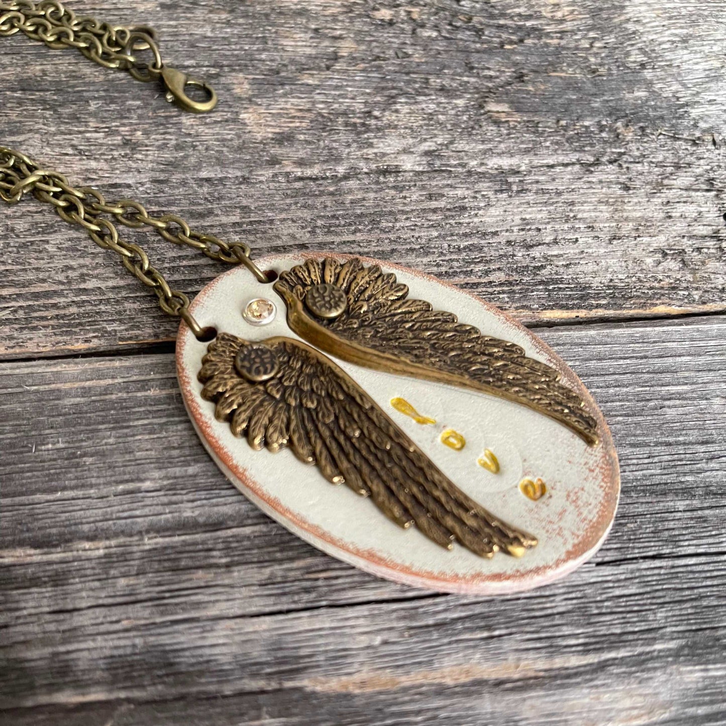 Unique, one of a kind leather pendant necklace with wing design