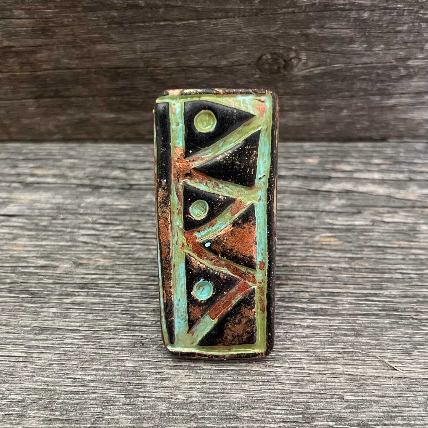 Big clay statement ring with Aztec design