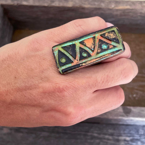 Big clay statement ring with Aztec design