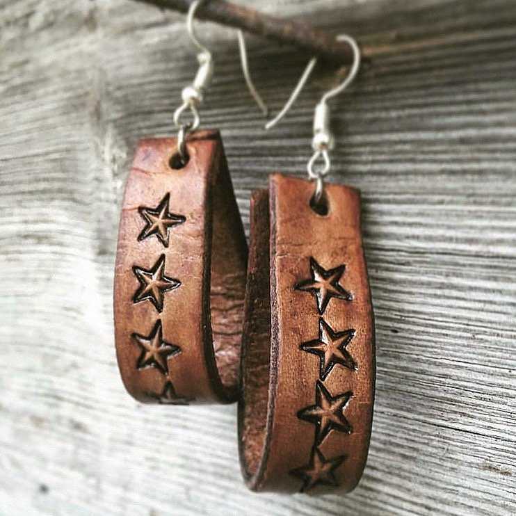 Genuine leather drop earrings with tooled stars design