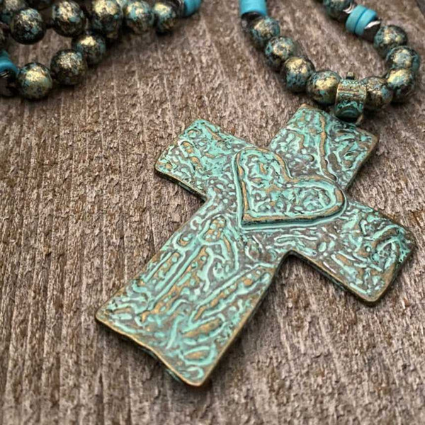 Vintage Turquoise and antique brass cross