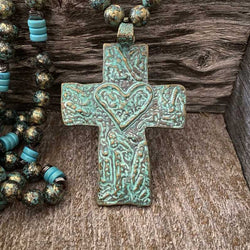 Vintage Turquoise and antique brass cross